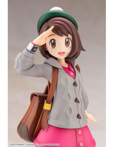 Gros plan du visage de la figurine Gloria et du Pokémon Larméléon