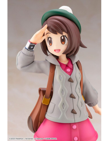 Gros plan du visage de la figurine Gloria et du Pokémon Larméléon