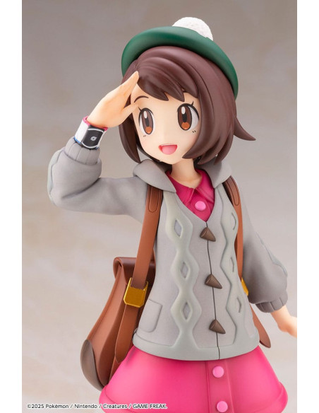 Gros plan du visage de la figurine Gloria et du Pokémon Larméléon