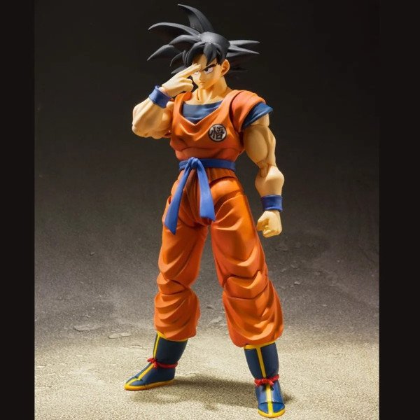 Son Goku S.H. Figuarts réalisant le geste de l’Instant Transmission, pose iconique – Dragon Ball Z (Bandai Spirits).