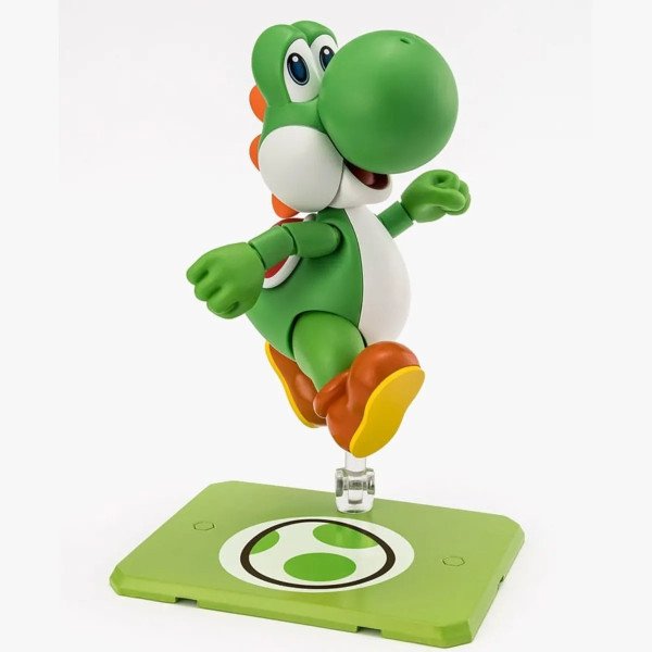 Figurine Yoshi S.H. Figuarts de Super Mario en pose de saut sur support vert avec motif œuf