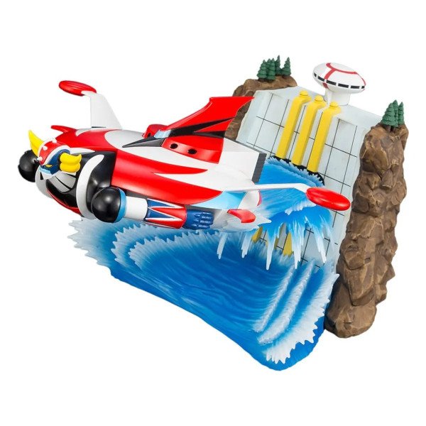 Grendizer Scene Selection 02 en vol devant la base, avec effets d’eau bleus et décor rocheux