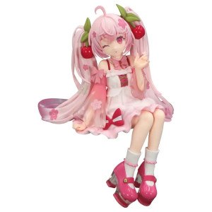 Figurine Sakura Miku 2025 Wink Ver. Noodle Stopper FuRyu assise, clin d’œil, couettes roses et cerises