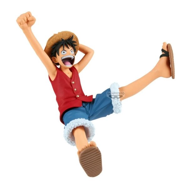 Figurine Monkey D. Luffy Romance Dawn Vol.1 en pose sautée, bras levé, jambe tendue et grand sourire.