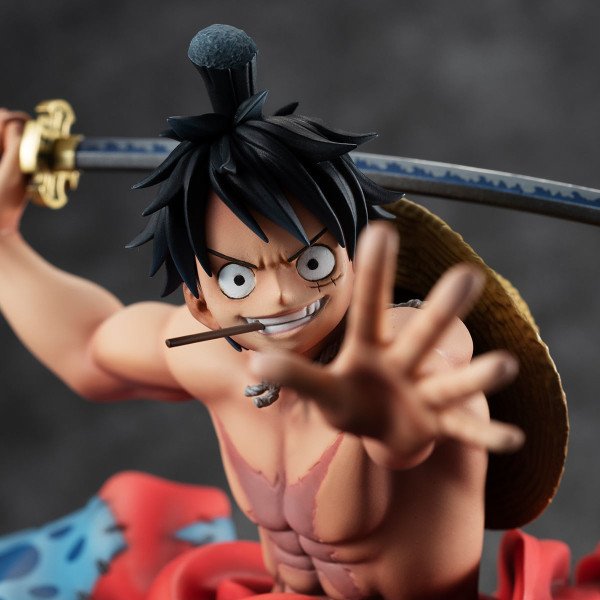 Gros plan de Luffy Taro P.O.P Warriors Alliance MegaHouse avec sourire et sabre